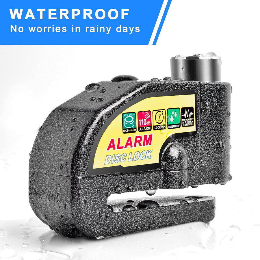 Disc brake alarm lock covered in water droplets